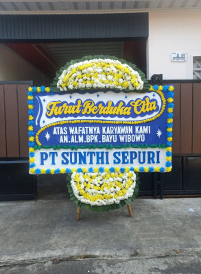 Papan Bunga Duka di Batu Kota