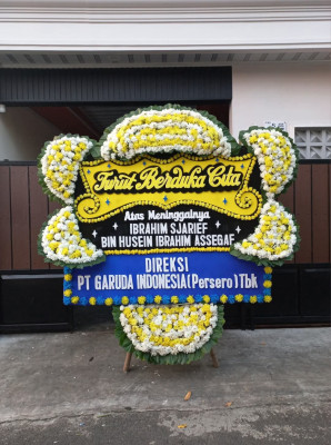 Papan Bunga Duka di Batu Kota