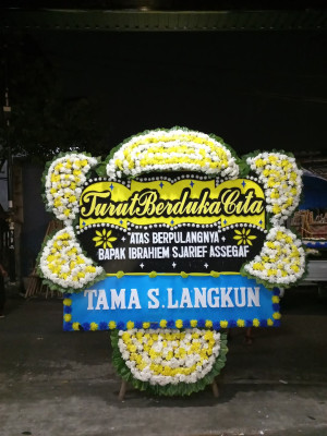Papan Bunga Duka di Batu Kota