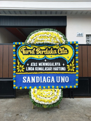 Papan Bunga Duka di Batu Kota