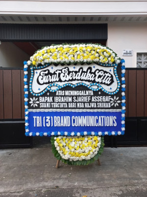Papan Bunga Duka di Batu Kota